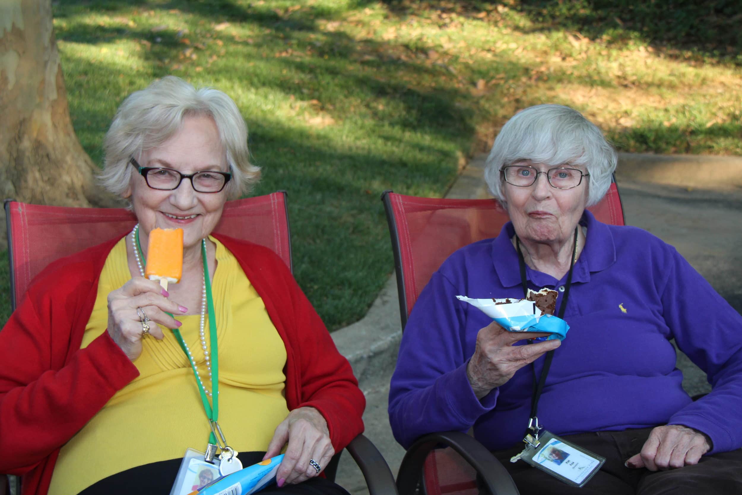 Two residents enjoy frozen treats at Kensington Park.