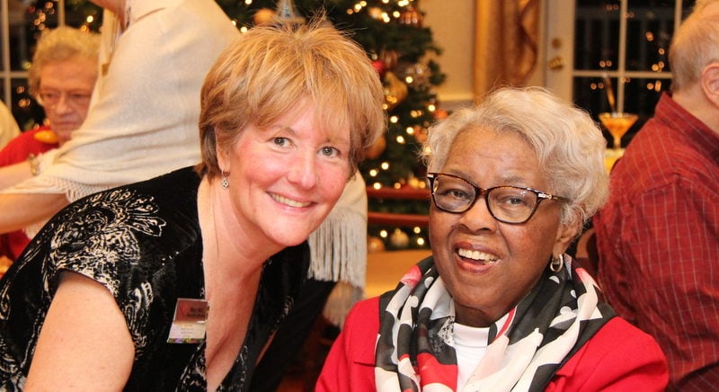 Mary & resident at Holiday Party
