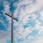 catholic cross against cloudy sky