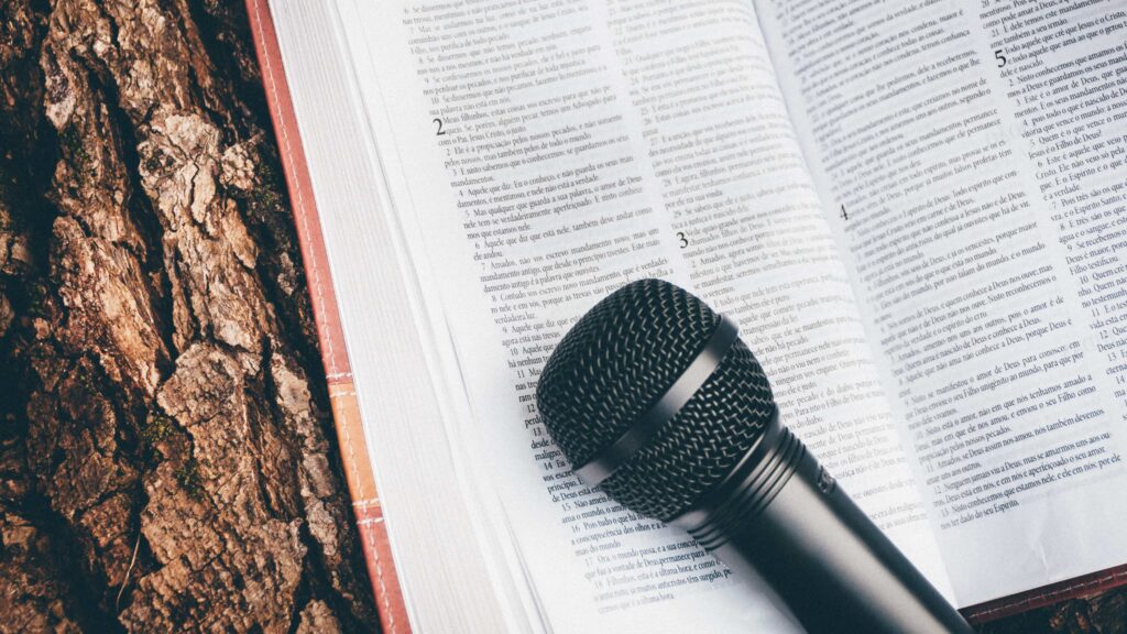 Microphone and bible on tree