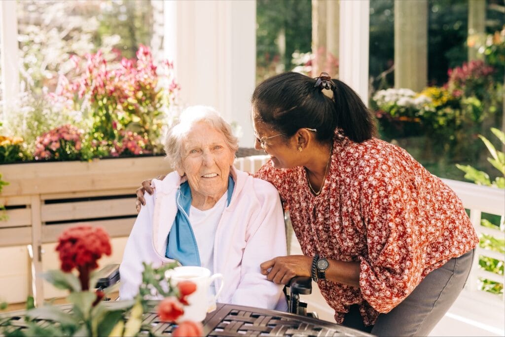 two women smiling together