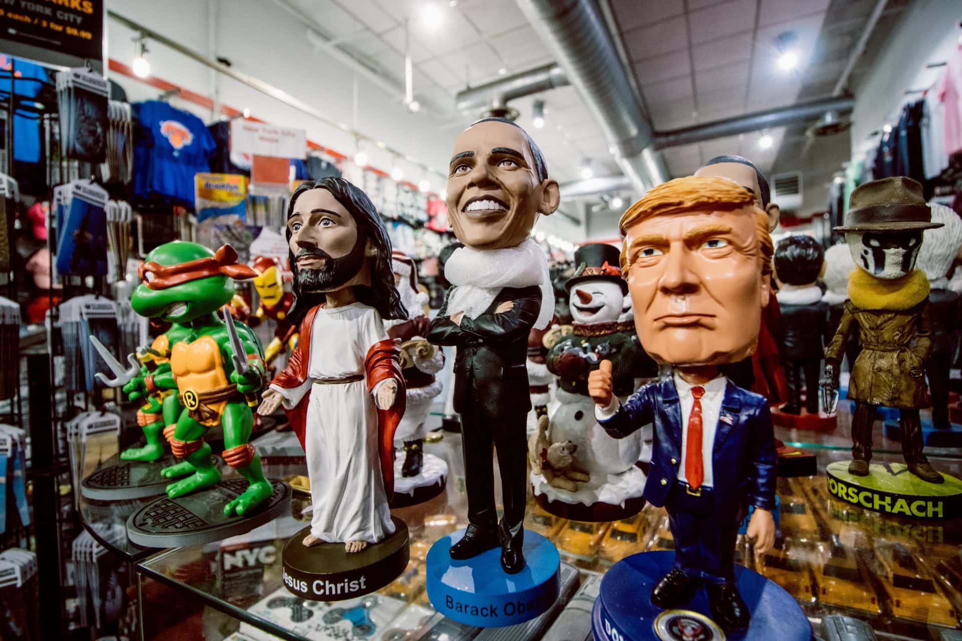 Bobble Head souvenirs of ninja turtle, jesus, obama, and trump